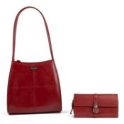 A red leather Kate Spade, New York handbag and a purse by Coach UK in a similar red (2) Red bag good
