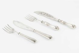 A pair of early Victorian silver fish servers, with pierced and florally engraved decoration by