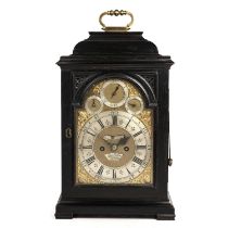 An 18th century ebonised bracket clock, the break arch brass dial with silvered Roman chapter