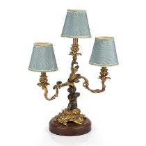 A 19th century French gilt bronze cherub triple branch candelabra converted to electric, 33cm wide