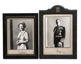 A signed Royal photograph of Queen Elizabeth II 1987, framed, 22cm x 28cm; together with a signed