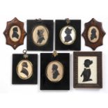 A group of 19th century silhouette portraits of men and women in various frames (7)