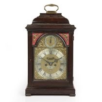 A George III mahogany bracket clock, the break arch brass dial with silvered Roman chapter ring,