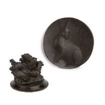 An Alice in Wonderland bronze plaque 10.5cm diameter and a small bronze of chickens 8cm wide 6cm