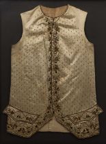 A late 18th or early 19th century European gentleman's silk waistcoat, finely embroidered with