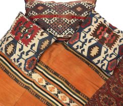 An Antique Tekke rug ground rug, 70cm x 118cm; together with a Jajim rug and three rug covered