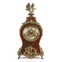 A large late 19th century French Boulle work mantle clock with gilt mounts and an enamelled dial