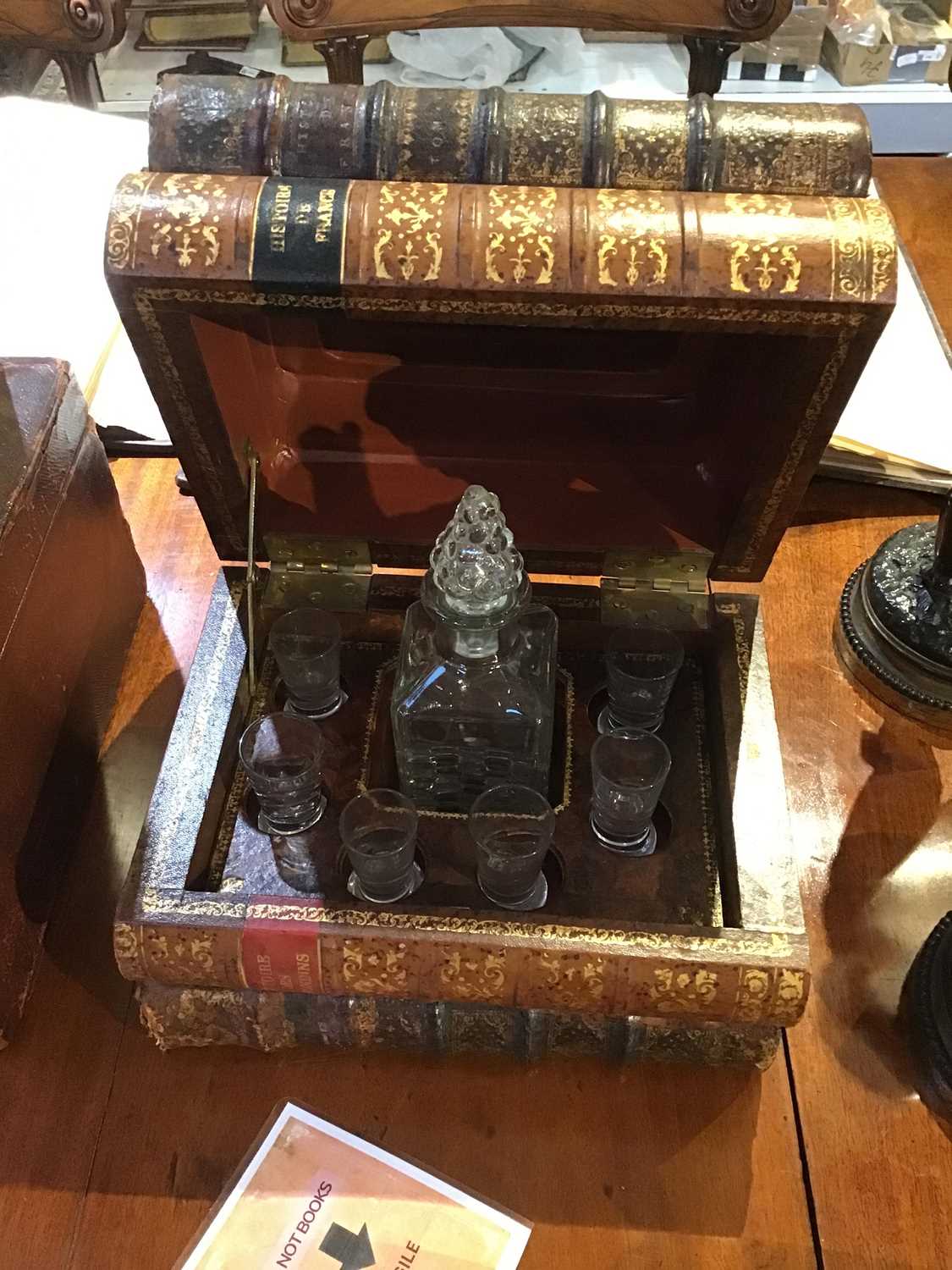 An early 20th century French leather bound Tantalus in the form of a stack of books, with later - Image 6 of 12