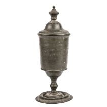 An antique German lead chalice and cover with an inscription 14cm wide 34cm high.