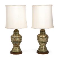 A pair of 19th century eastern brass and copper inlaid lamp bases 27cm wide 60cm high later