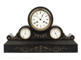 A 19th century French polished slate mantel clock with white enamel Roman dial, drum movement and