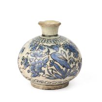 A 17th century Safavid bottle vase 13cm wide 14cm high circa 1680 Rim chips to top and foot