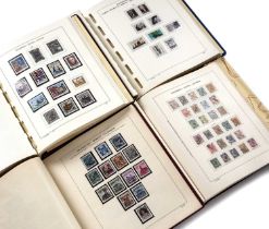 Four 20th century German and Austrian stamp albums