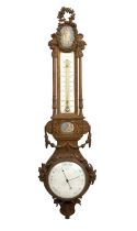 A late 19th century French gilt metal cartel barometer in the manner Emmanuel-Alfred Paris, with