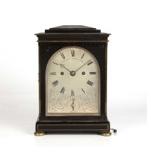 A 19th century ebonised mantle clock, the silvered Roman dial signed John Moore & Sons, Clerkenwell,