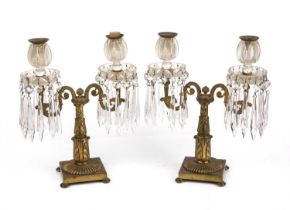 A pair of 19th century gilt metal twin branch lustre candlesticks 28cm wide 33.5cm high wear to