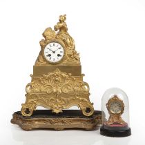 A 19th century gilt metal boudoir or desk top timepiece with engine turned silvered Roman dial and