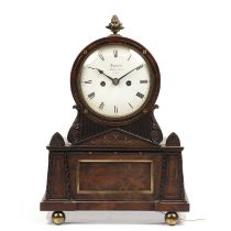 A Regency mahogany Egyptian revival table clock, the white enamel Roman dial signed Leplastrier,