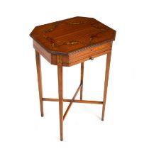 An Edwardian Sheraton revival painted satinwood sewing table with a lifting top and square