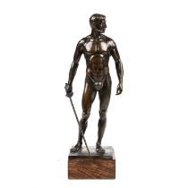 After Oscar Bodin (1868-1940) a late 20th century bronzed figure standing male fencer after the