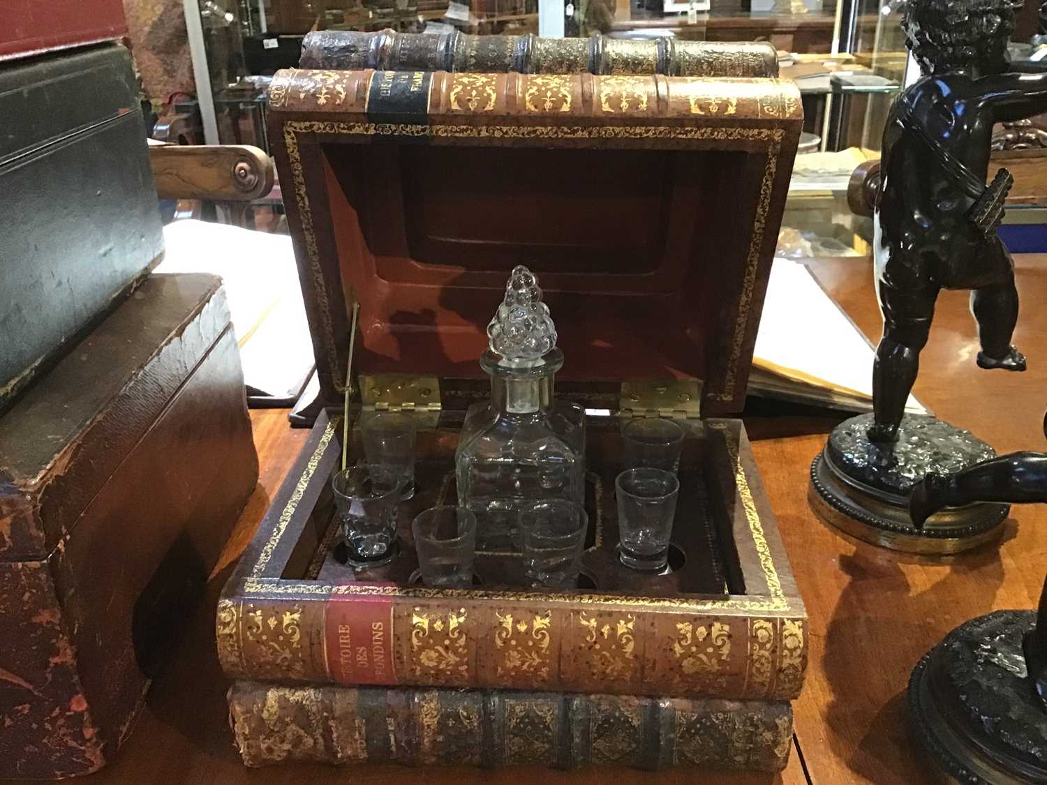 An early 20th century French leather bound Tantalus in the form of a stack of books, with later - Image 7 of 12
