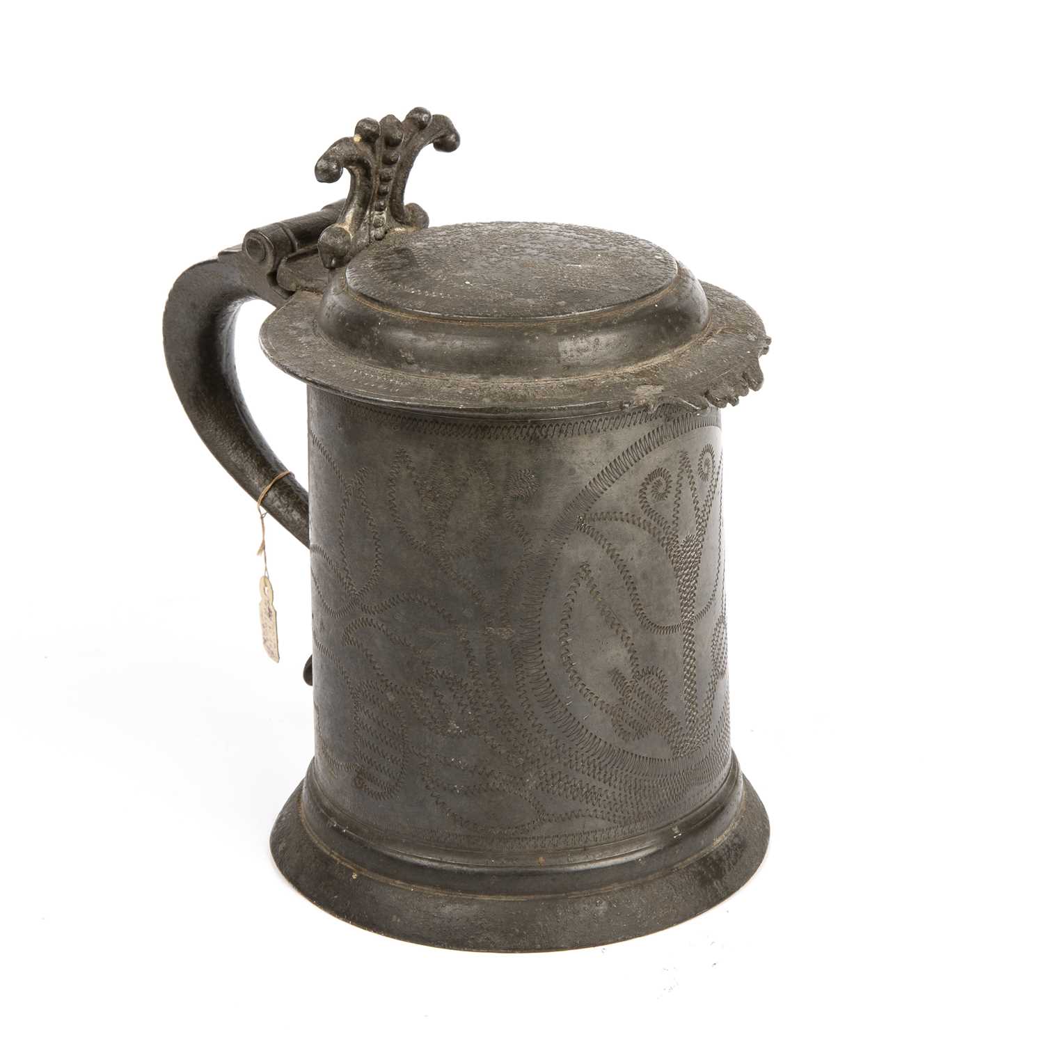 A 17th century wriggle work pewter flat lidded tankard by Lawrence Anderton of Wigan circa 1660-1690