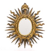 An antique Spanish gilt sunburst wall mirror 34cm wide 39cm high Small chips and marks, later glass.