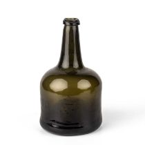 An 18th century mallet shaped green glass bottle 12cm wide 22cm high Provenance: Malcolm Deas