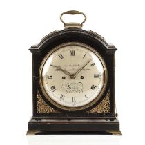 A George III ebonised bracket or table clock, the painted convex Roman dial with Arabic ten