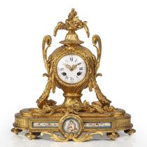 A 19th century French gilt brass mantle clock, the convex white enamel dial with blue Roman chapters