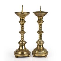 A pair of brass pricket candlesticks with spiral stems and ball feet 17cm wide 53cm high