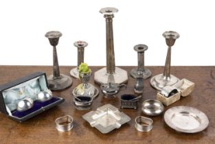 Collection of miscellaneous silver to include: silver napkin rings, various silver candlesticks with