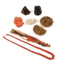 Group of pieces Chinese and Japanese, including a carved coral pendant, a mother of pearl netsuke,