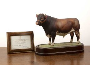Royal Worcester porcelain 'Daisy Shorthorn bull' modelled by Doris Lindner, on original wooden