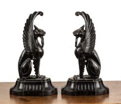 Pair of painted cast iron griffins andirons or door porters, unmarked, 38cm high x 12cm wide x