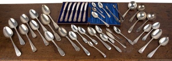 Collection of miscellaneous silver flatware including: a cased set of six silver handled butter
