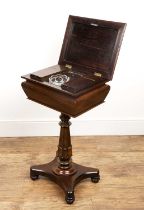 Early Victorian rosewood teapoy with a hinged lid opening to reveal a fitted interior with various