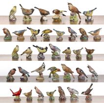 Collection of thirty four Royal Worcester birds in matt glaze finish, to include: red cardinal,
