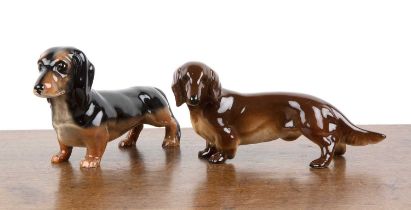 Two ceramic dachshunds the first Beswick, approximately 23cm long, the second probably Beswick,