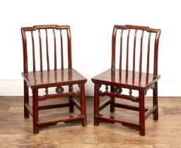 Pair of stained wood child's chairs Chinese provincial, 69.5cm high x 40cm wide Wear to both and