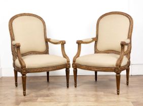Pair of beechwood Louis XV-style carved armchairs French, the frames with acanthus leaf decoration
