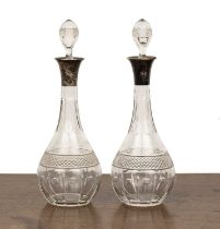Pair of silver mounted wine decanters with silver collars and hobnail cut decoration, bearing