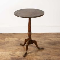 Oak circular wine table on a tripod base, with carved details, 50.5cm diameter x 67.5cm high With