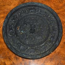 Bronze tang-style mirror Chinese, with a central dog of fo, within a surround of mythical animals