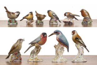 Ten Royal Worcester porcelain models of various birds in glazed finish, all bearing marks to the