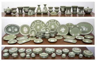 Large collection of sage green Wedgwood Jasperware each piece decorated with cream details in low