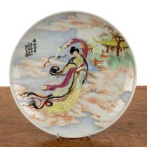 Polychrome porcelain and enamelled dish Chinese, mid 20th Century, painted with Guanyin in a flowing