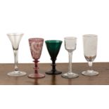 Group of five antique drinking glasses comprising: an 18th Century round funnel bowl glass on an air