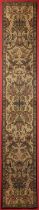Long-mounted panel of fabric on a light ground, embroidered with various flowers and foliage, with a