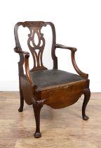 Mahogany commode chair 18th Century, possibly Irish, with a carved splat back, and original